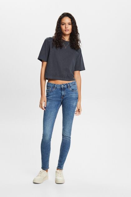 Z recyklovaného materiálu: strečové skinny džíny se středně vysokým pasem