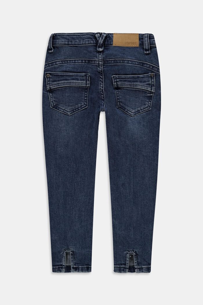 Z recyklovaného materiálu: džíny s rozparky a nastavitelným pasem