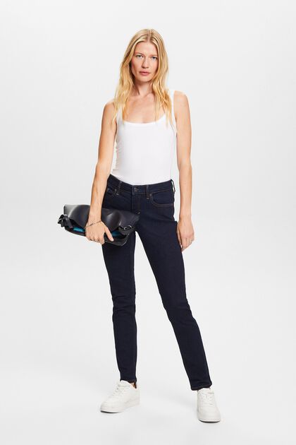 Z recyklovaného materiálu: strečové slim džíny se středně vysokým pasem