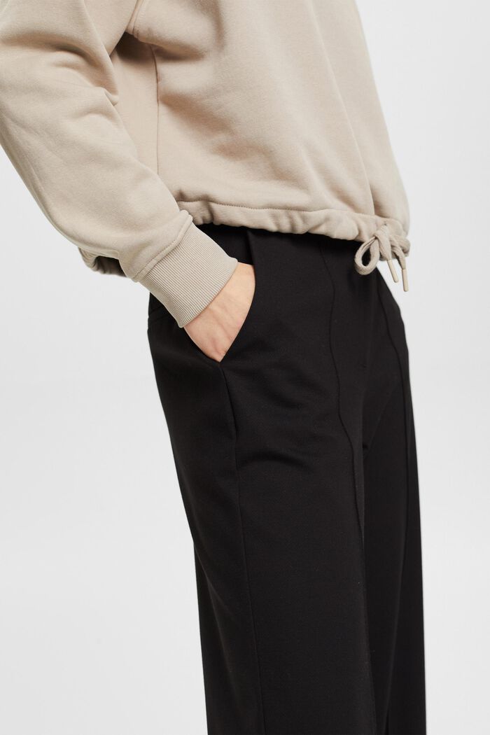 Kalhoty se středním pasem a širokými nohavicemi, BLACK, detail image number 2