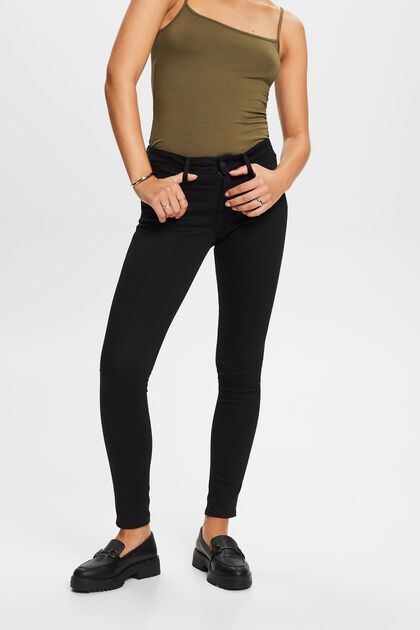 Z recyklovaného materiálu: strečové skinny džíny se středně vysokým pasem